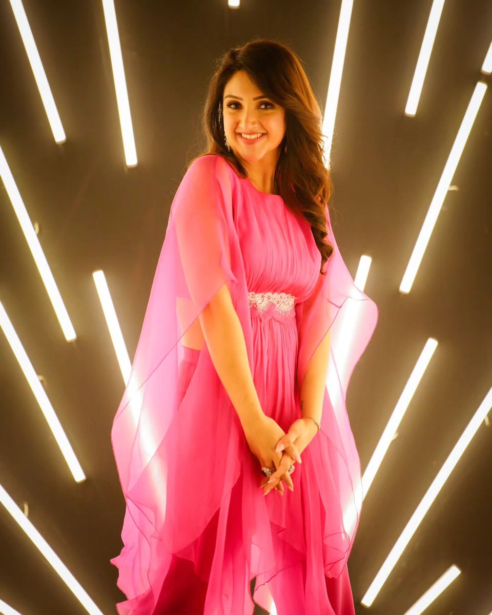 Sridevi smiling gracefully in a stylish pink gown photoshoot
