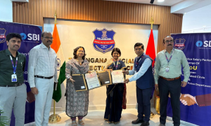 Telangana Special Protection Force and SBI officials holding MoU documents during the signing ceremony for SPF salary and welfare package in Hyderabad