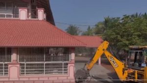 HYDRAA team demolishing illegal 6-story building and Mukheem guest house in Ameenpur Sangareddy