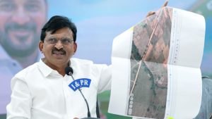 Minister Ponguleti Srinivas Reddy showing Google Maps evidence of land encroachment during a press conference in Secretariat