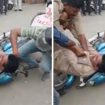 UP police fight on road video: నడిరోడ్డుపై కొట్టుకున్న ట్రాఫిక్ పోలీసులు.. వసూళ్ల పంపకాల్లో తేడా రావడంతో తన్నులాట!