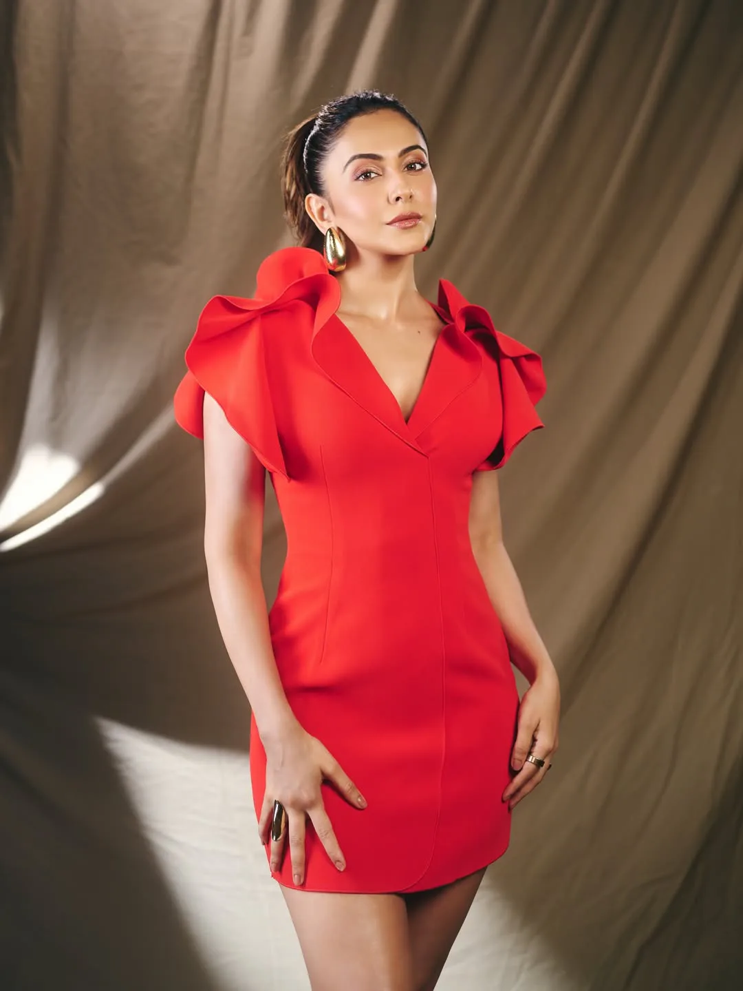 rakul preet singh latest photos in red skirt