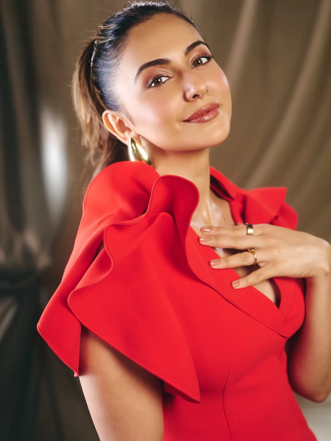 rakul preet singh latest photos in red skirt