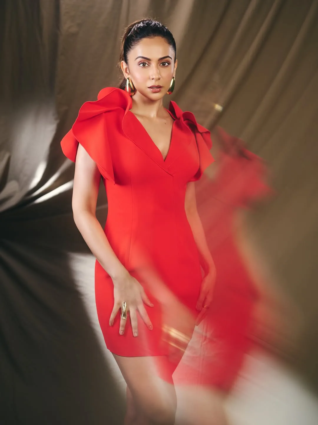 rakul preet singh latest photos in red skirt