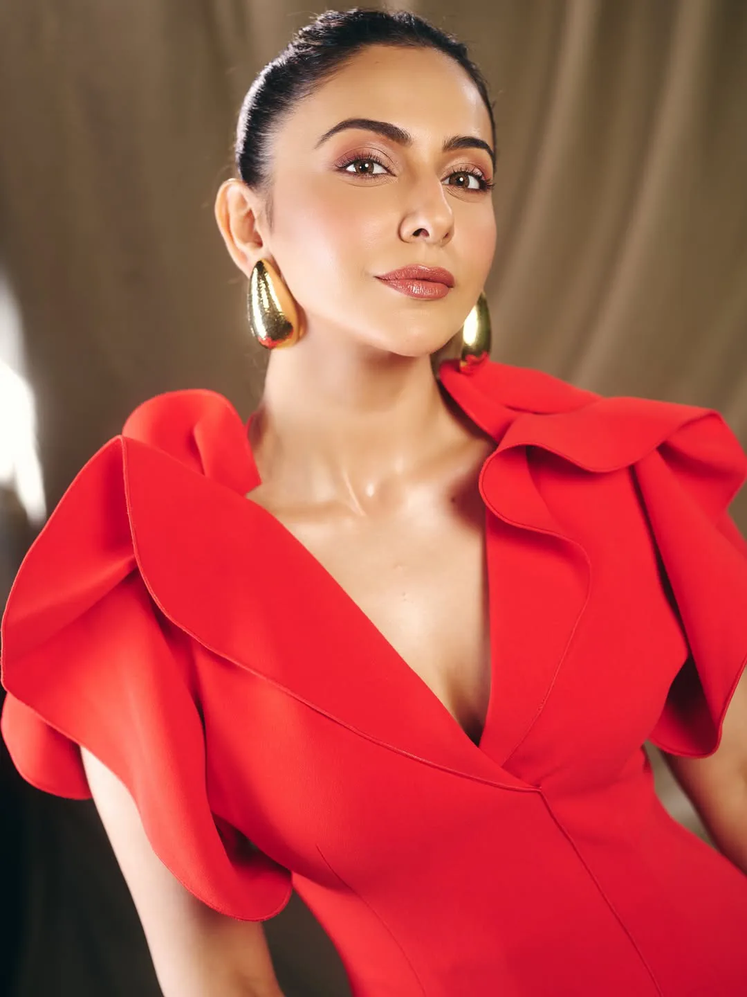 rakul preet singh latest photos in red skirt